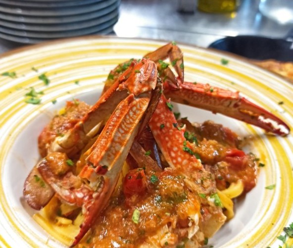 Crab fettuccine with datterini tomatoes